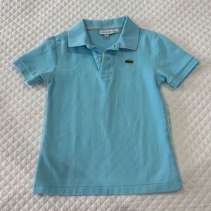 Lacoste's signature piqué knit fabric light blue Sz 6